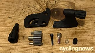 The parts included in the Ratio 12-speed gear kit for a road bike