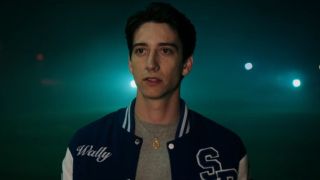 Milo Manheim as Wally looking at his door in School Spirits. 