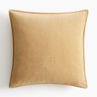 Muted yellow throw pillow