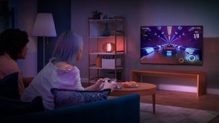 two people gaming on the lg c2 oled