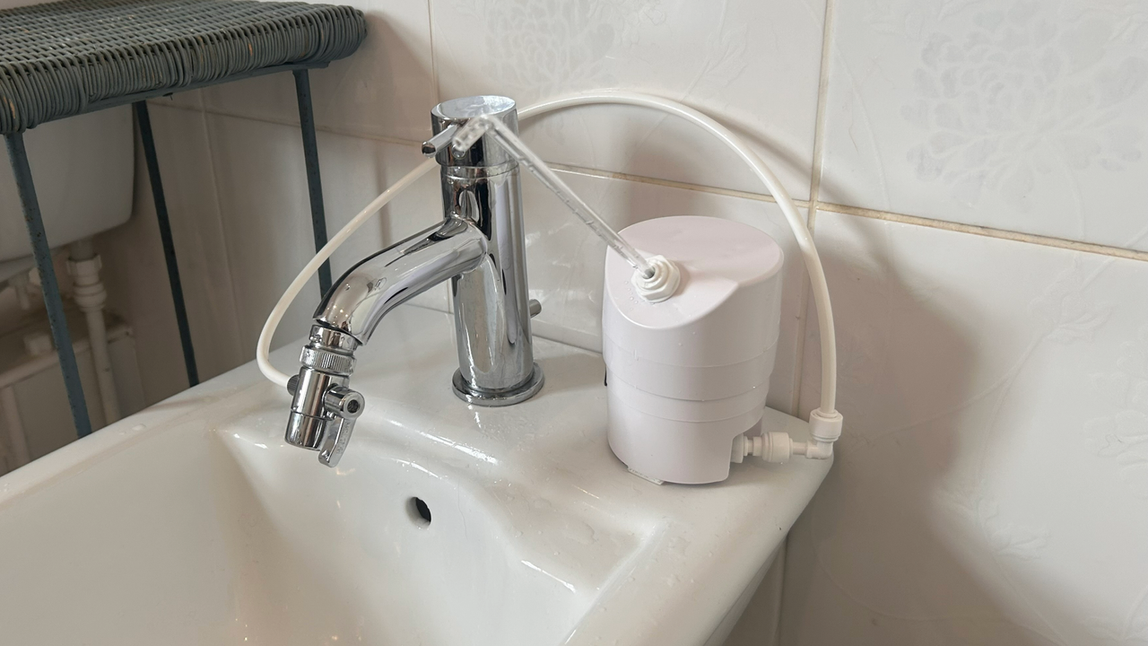 Aquapurr 4, one of the best pet water fountains, attached to Megan's bidet