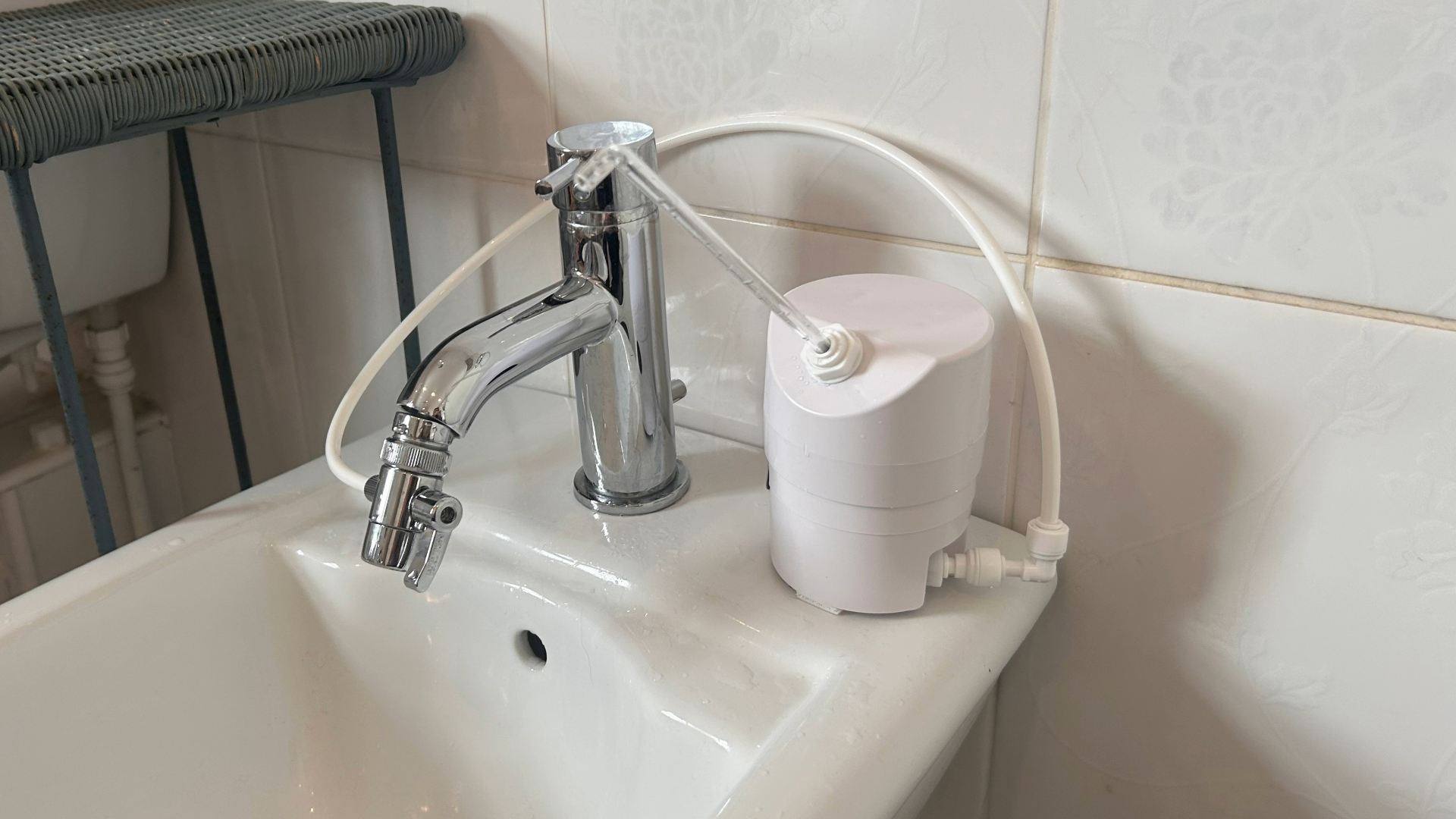 Aquapurr 4, one of the best pet water fountains, attached to Megan's bidet