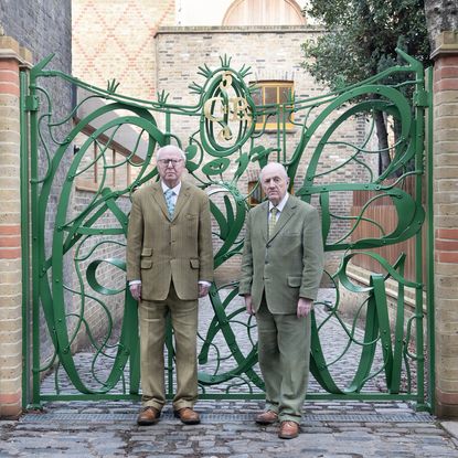 Gilbert & George at the gates to The Gilbert & George Centre