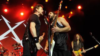Jason Newsted, Robert Trujillo,and Kirk Hammett of Metallica perform at Day Two of the bands' 30th Anniversary shows at The Fillmore on December 7, 2011 in San Francisco, California.