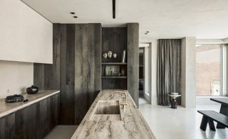 The natural stone surfaces in the kitchen