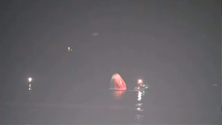 SpaceX's Crew Dragon Resilience bobs in the Gulf of Mexico after splashdown.