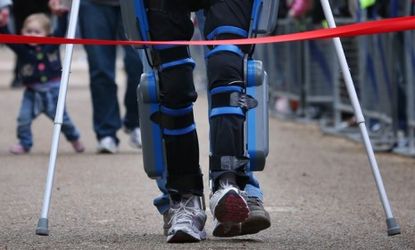 Claire Lomas crosses the finishing line of the London Marathon on May 8: Lomas was one of 36,000 runners in the race, but the only one who is paralyzed.