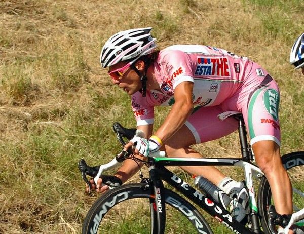 Race leader Danilo Di Luca keeps close tabs on Armstrong and Leipheimer while descending the Passo del Turchino.