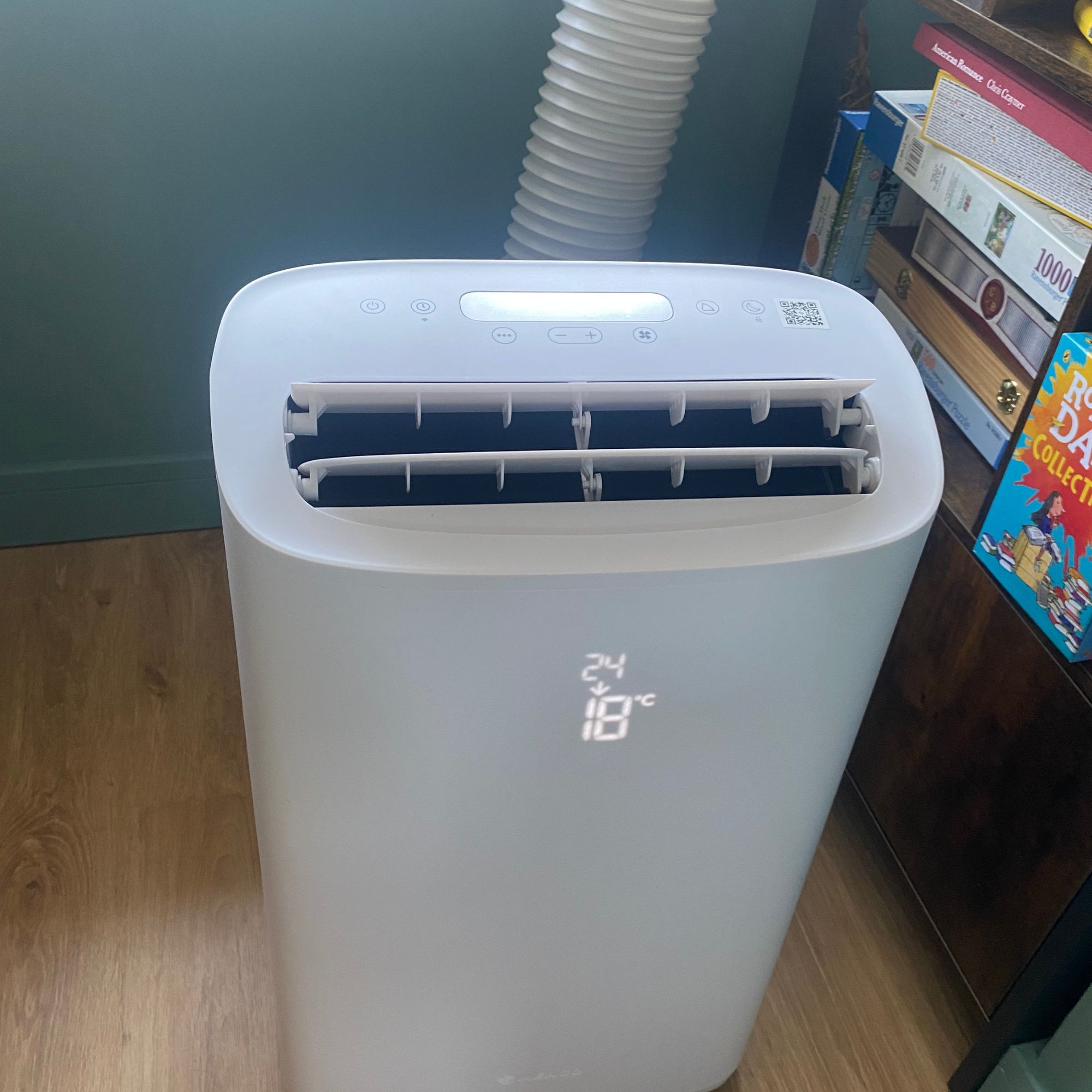 Meaco Cirro portable air conditioner in cooling mode in my home office next to a book case