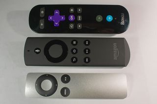 The Fire TV remote is a compromise between Roku's (top) and Apple's (bottom).
