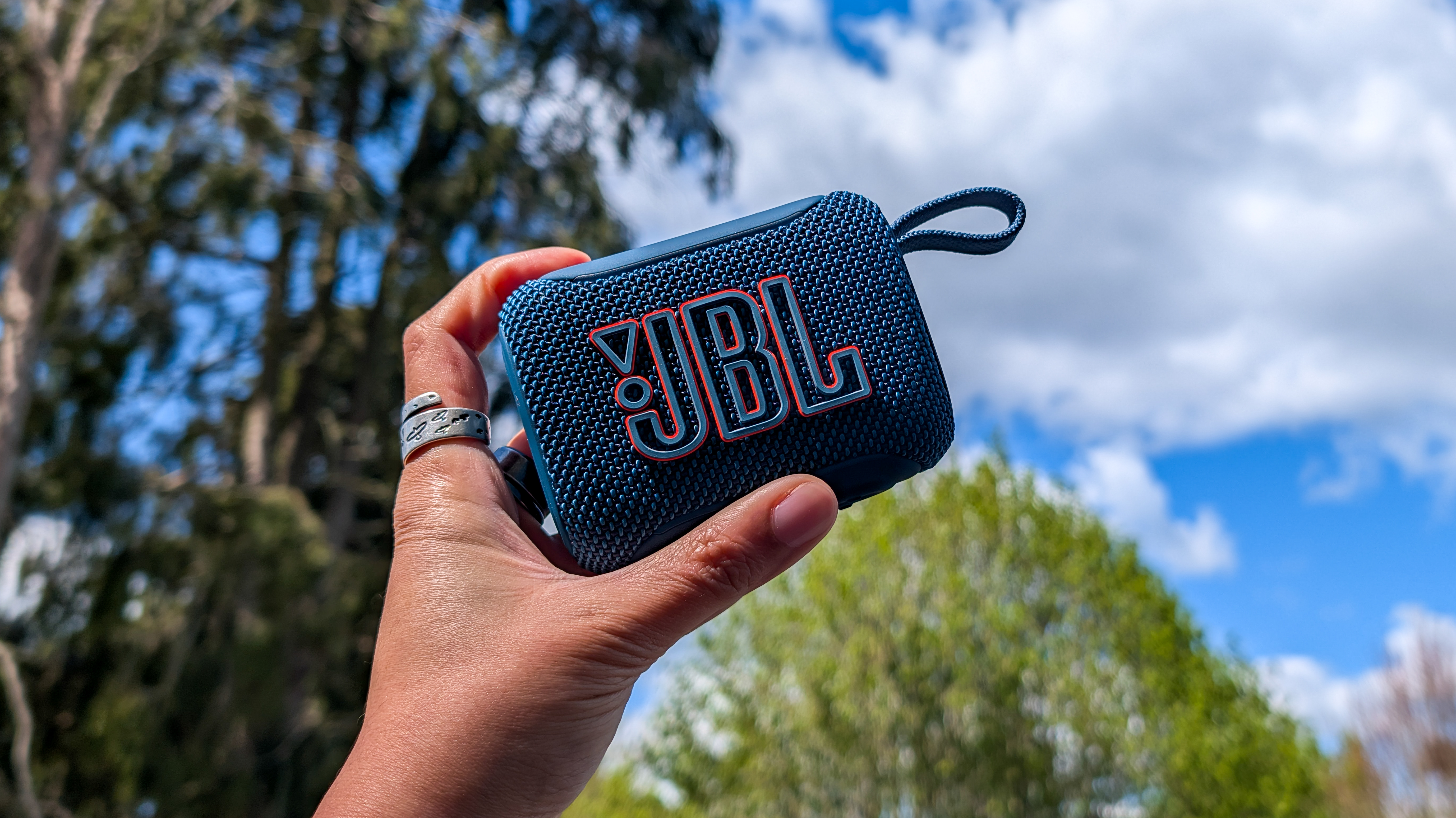A JBL Go 5 Bluetooth speaker in blue