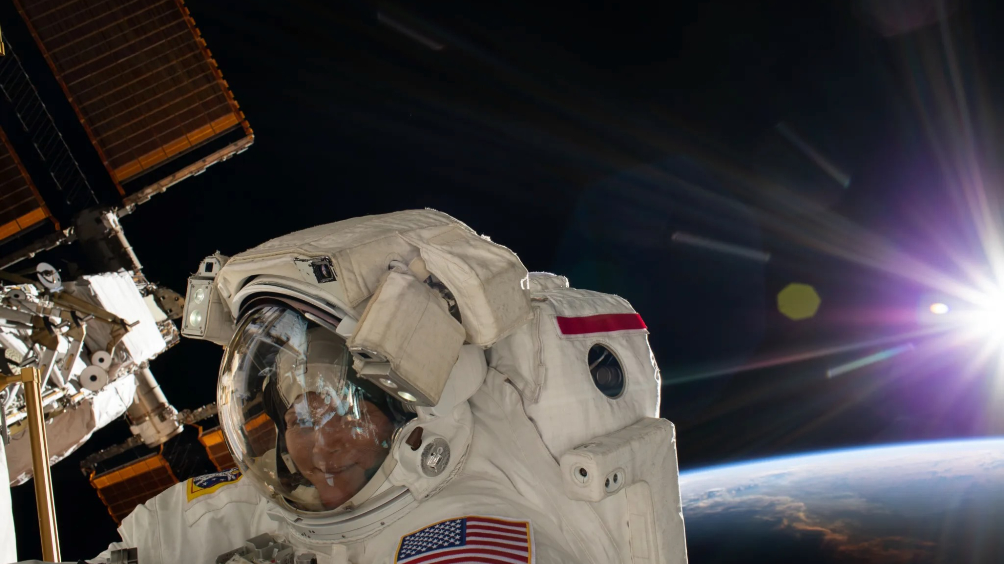NASA astronaut Anne McClain conducts a spacewalk outside the International Space Station on March 22,2019.