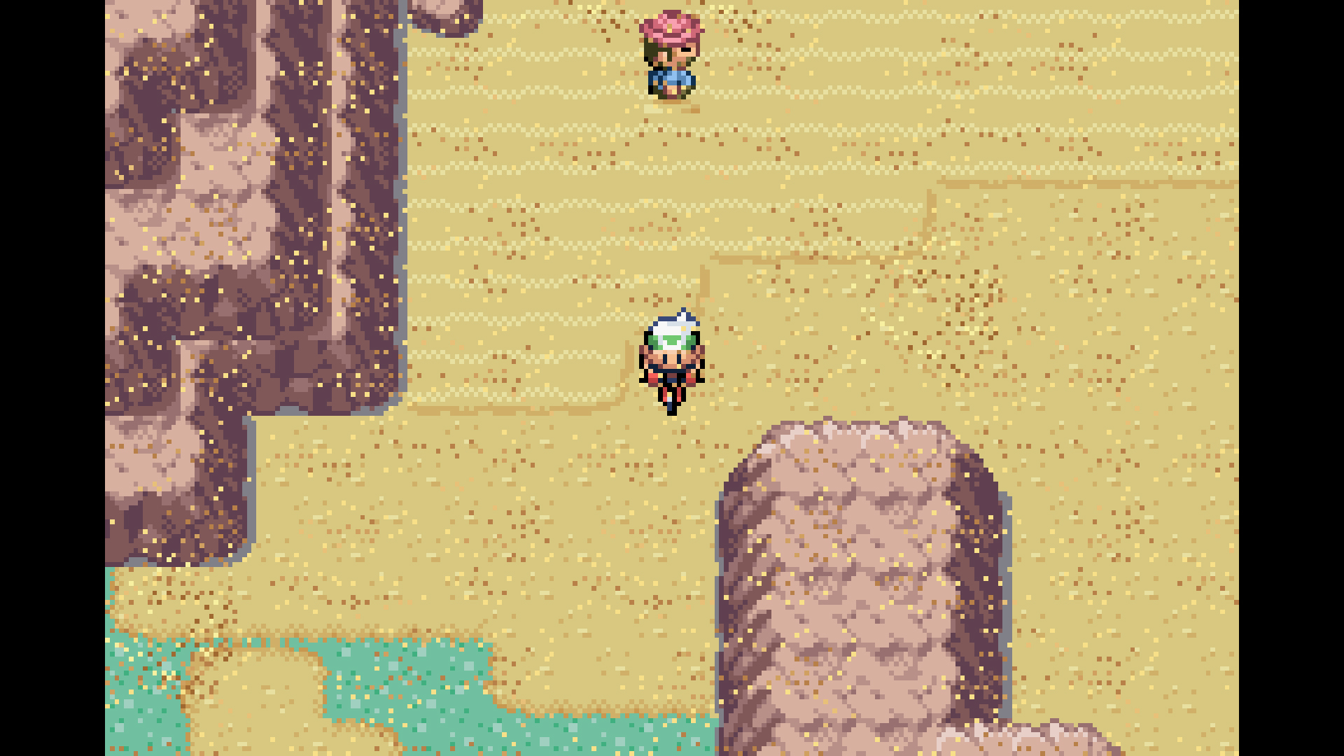 The player rides a bike through a desert area as a sandstorm rages - from Pokemon Ruby, Sapphire, and Emerald's entry in The Story of Pokemon bookazine
