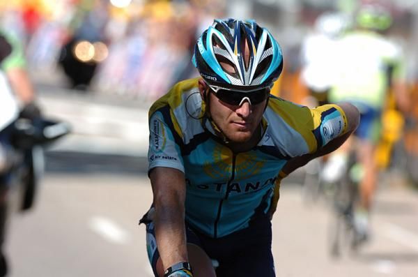 Levi Leipheimer crosses the finish line after being involved in a crash during the final kilometres of stage 12.