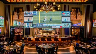The 13,000-square-foot and 350+ seat Bankroll in Philly is a plush sports bar offering high-quality video and sound. 