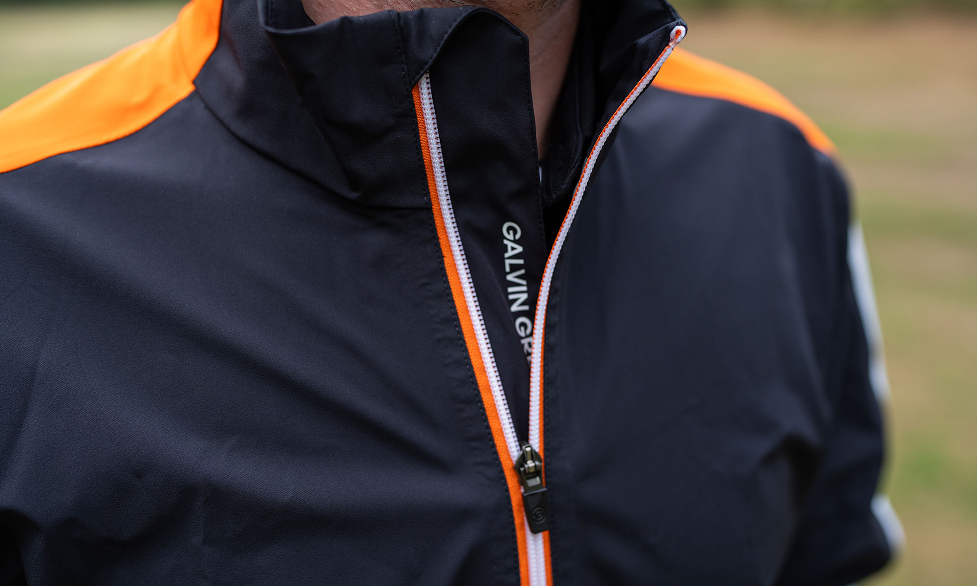 Collar and logo with zip on Galvin Green Arlo waterproof Jacket