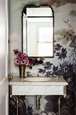 cloakroom with decorative wallpaper