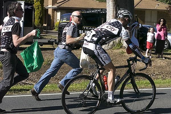Mobile musettes: Chris Steffanoni (Cycle-City) had some helpers on the run at a feed-zone in Inverleigh.