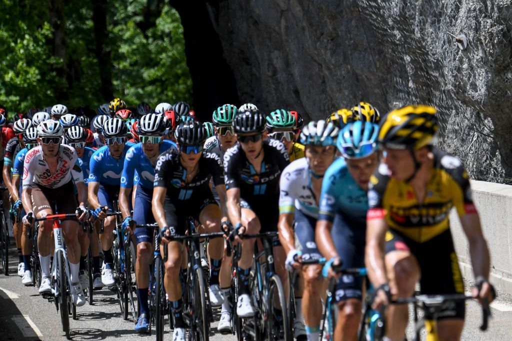 The pack rides during the sixth stage of the 73rd edition of the Criterium du Dauphine cycling race a 167km between LoriolsurDrome and Le SappeyenChartreuse on June 4 2021 Photo by Alain JOCARD AFP Photo by ALAIN JOCARDAFP via Getty Images