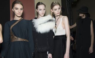 Female models dressed in the Lanvin A/W 2015 backstage of the fashion show