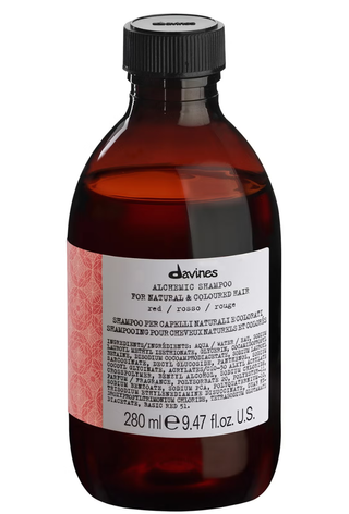 An image of Davines alchemic shampoo for copper hair.