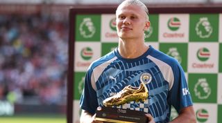 BRENTFORD, ENGLAND - MAY 28: Erling Haaland of Manchester City with the Golden Boot trophy during the Premier League match between Brentford FC and Manchester City at Gtech Community Stadium on May 28, 2023 in Brentford, England. (Photo by Charlotte Wilson/Offside/Offside via Getty Images)