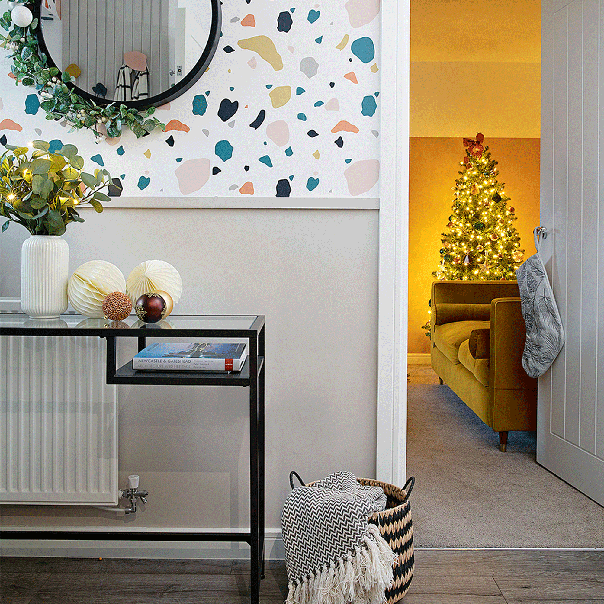 Hallway with terrazzo wallpaper and hall table