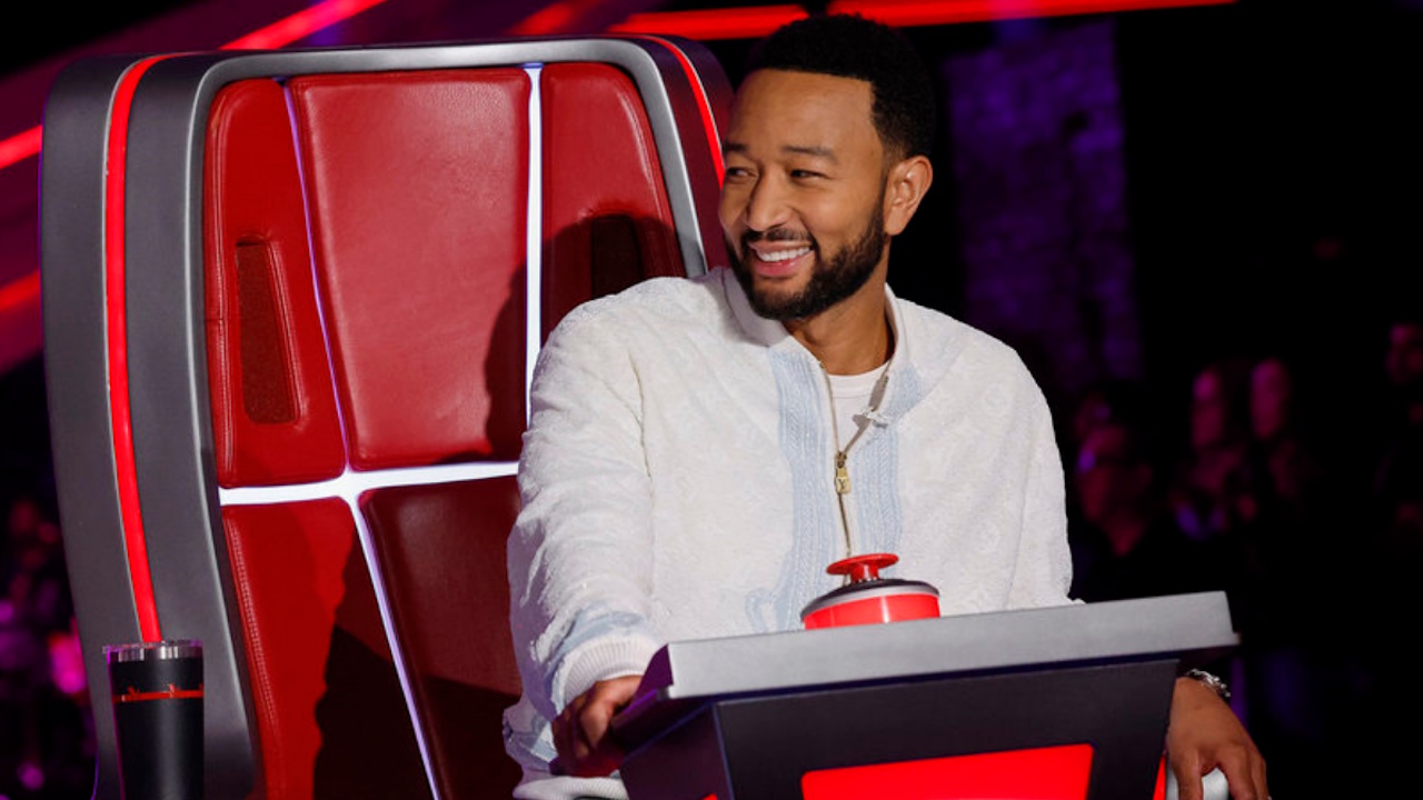 John Legend laughs during the Blind Auditions on The Voice Season 29.