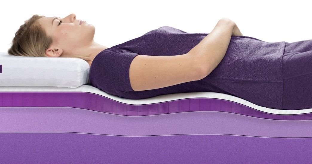 Woman sleeping on mattress