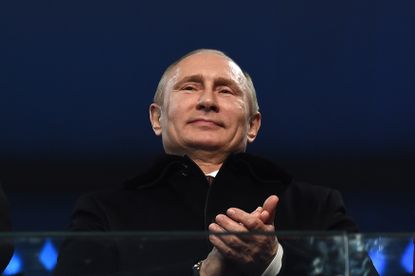Vladimir Putin applauds