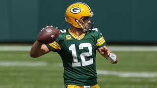 Aaron Rodgers hopes to lead the Green Bay Packers to the NFC championship game over the Los Angeles Rams Saturday, Jan. 16.