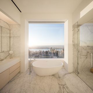 Image of a bathroom in a penthouse with New York skyline views