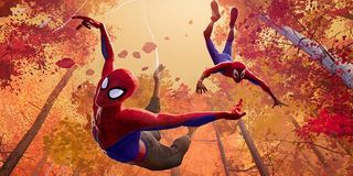 Peter Parker and Miles Morales swinging through the trees in Spider-Man: Into the Spider-Verse