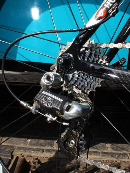 A standard Campagnolo Record rear derailleur will change gears across the tightly spaced cassette.