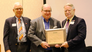 Larry Nass, Gary Cavell and BTS President Ralph Hogan.