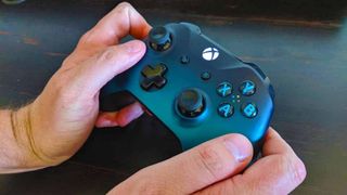Xbox One controller being held