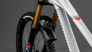Detail shot of Mondraker's Mind telemetry system integrated into a front mudguard