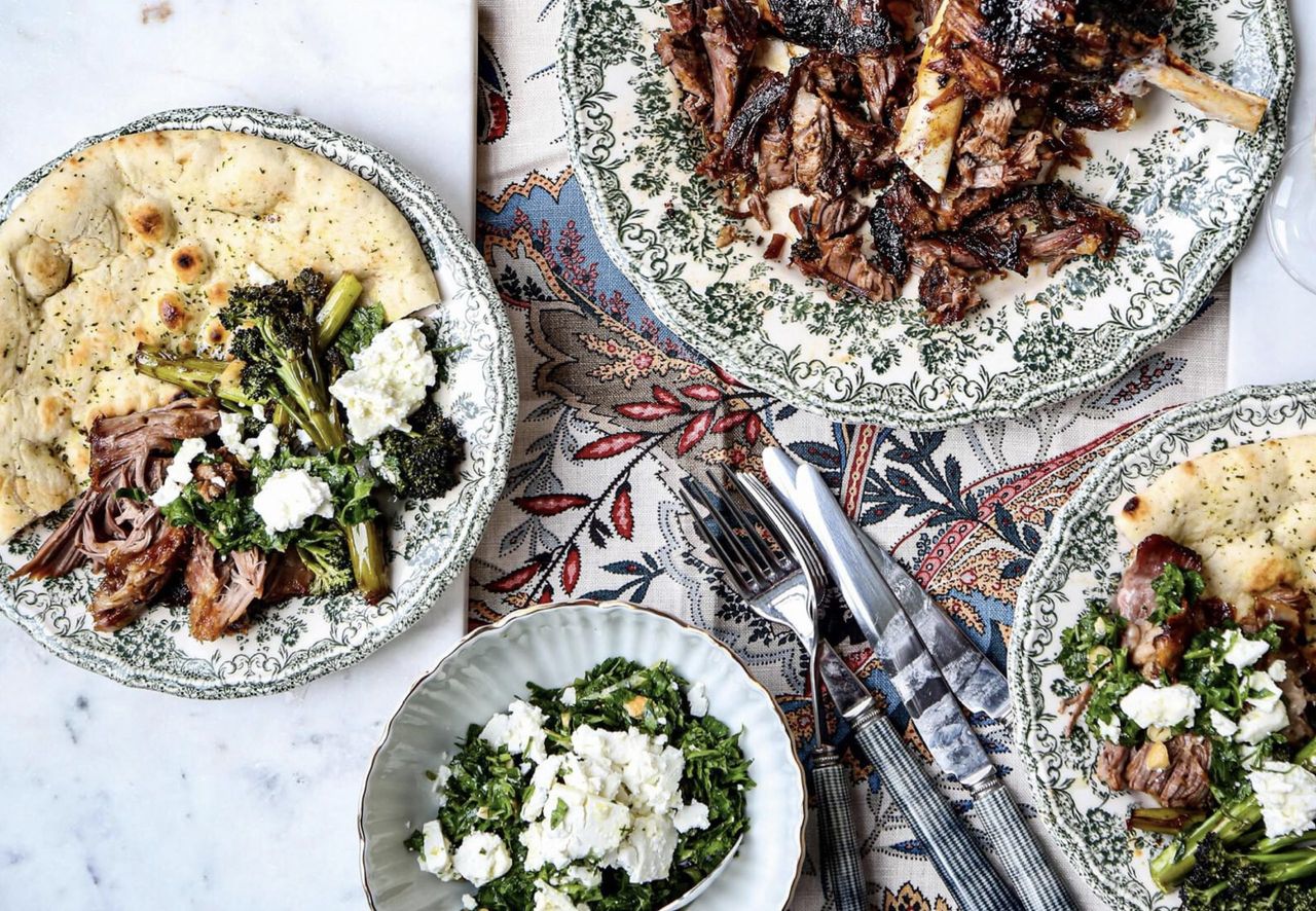 Slow-roasted shoulder of lamb with purple-sprouting broccoli and pistachio-and-feta gremolata. Easier to cook than to say.