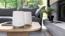 Orbi device on a table in the living room
