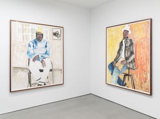 Installation view of Serge Attukwei Clottey's 'Beyond Skin' featuring a row of new painted portraits at Simchowitz Gallery, Los Angeles