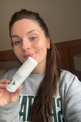 Tori holding Clinisoothe Skin Purifier