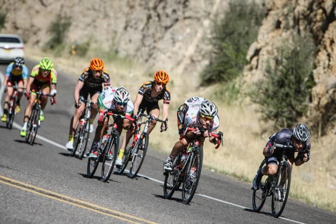 Breakaway riders descend early in the stage