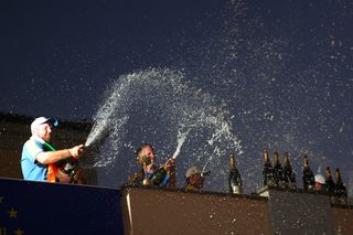 Team Europe spray champagne off the balcony