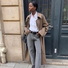 Girl in Paris wearing trench coat