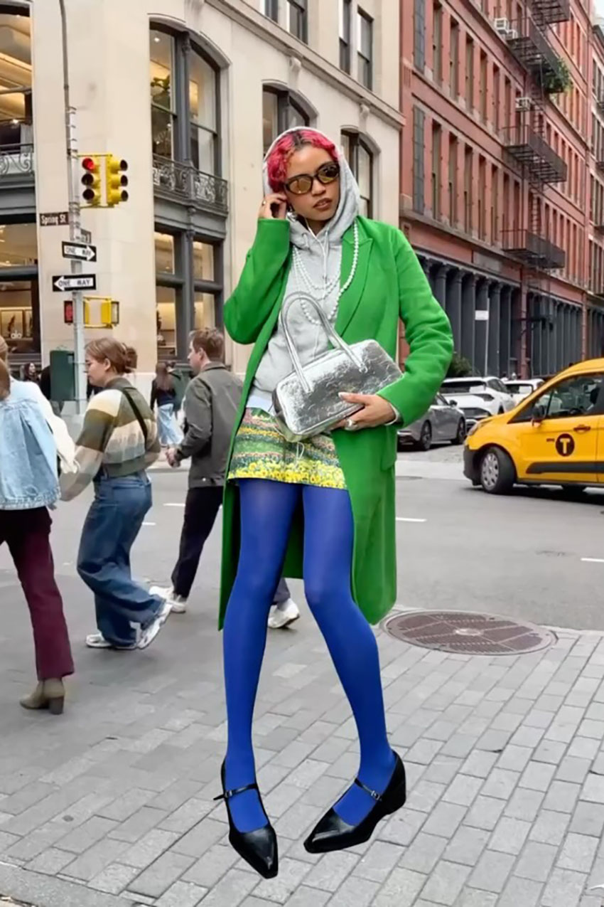 a woman wearing bright blue tights