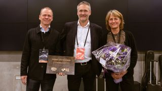 DPA Microphones CEO Kalle Hvidt Nielsen, Danish Sound Cluster CEO Torben Vilsgaard and DPA Microphones Vice President of Marketing Anne Berggrein accept an award.