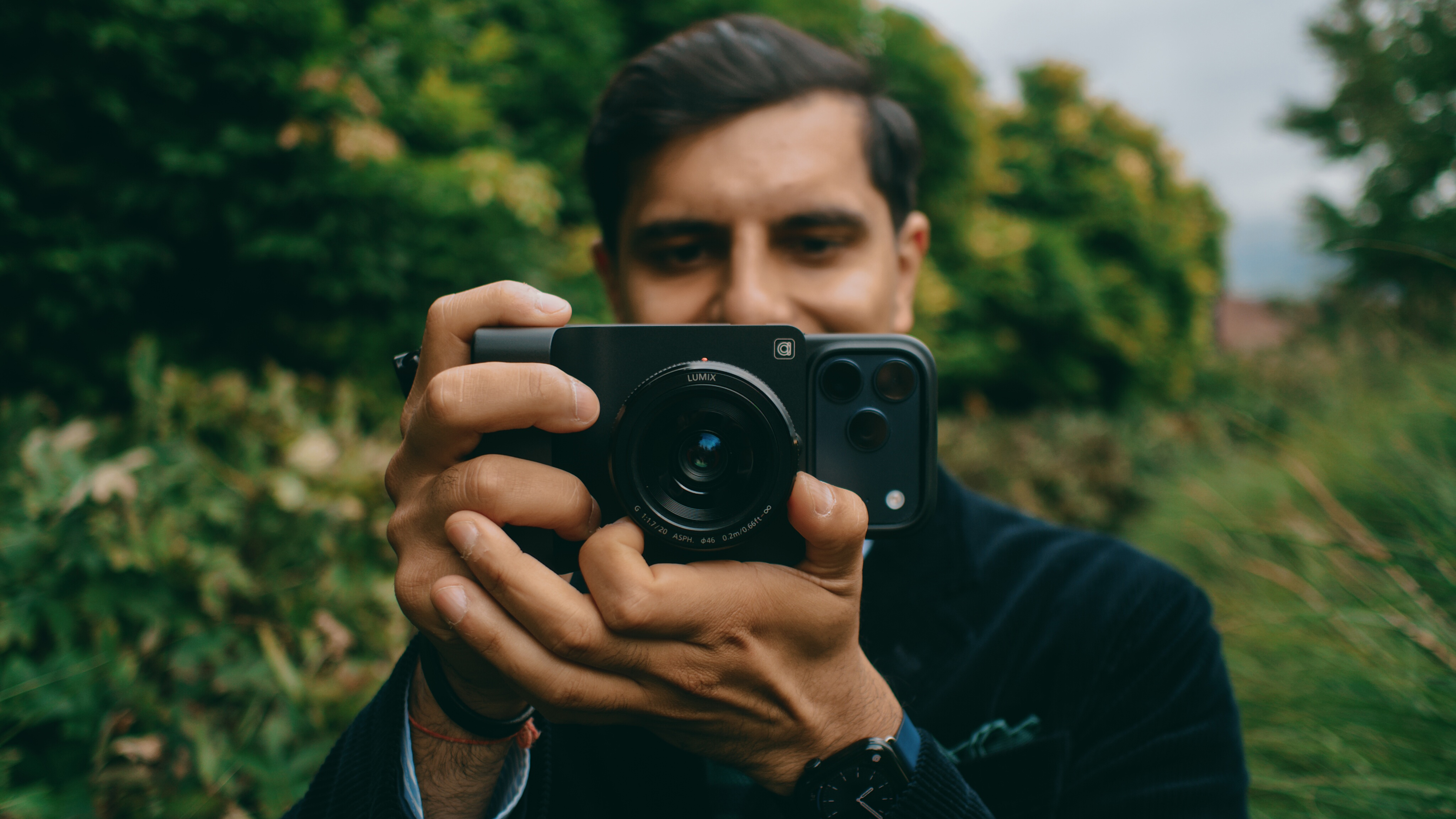 The Camera Intelligence Caira AI camera in a person&#039;s hands