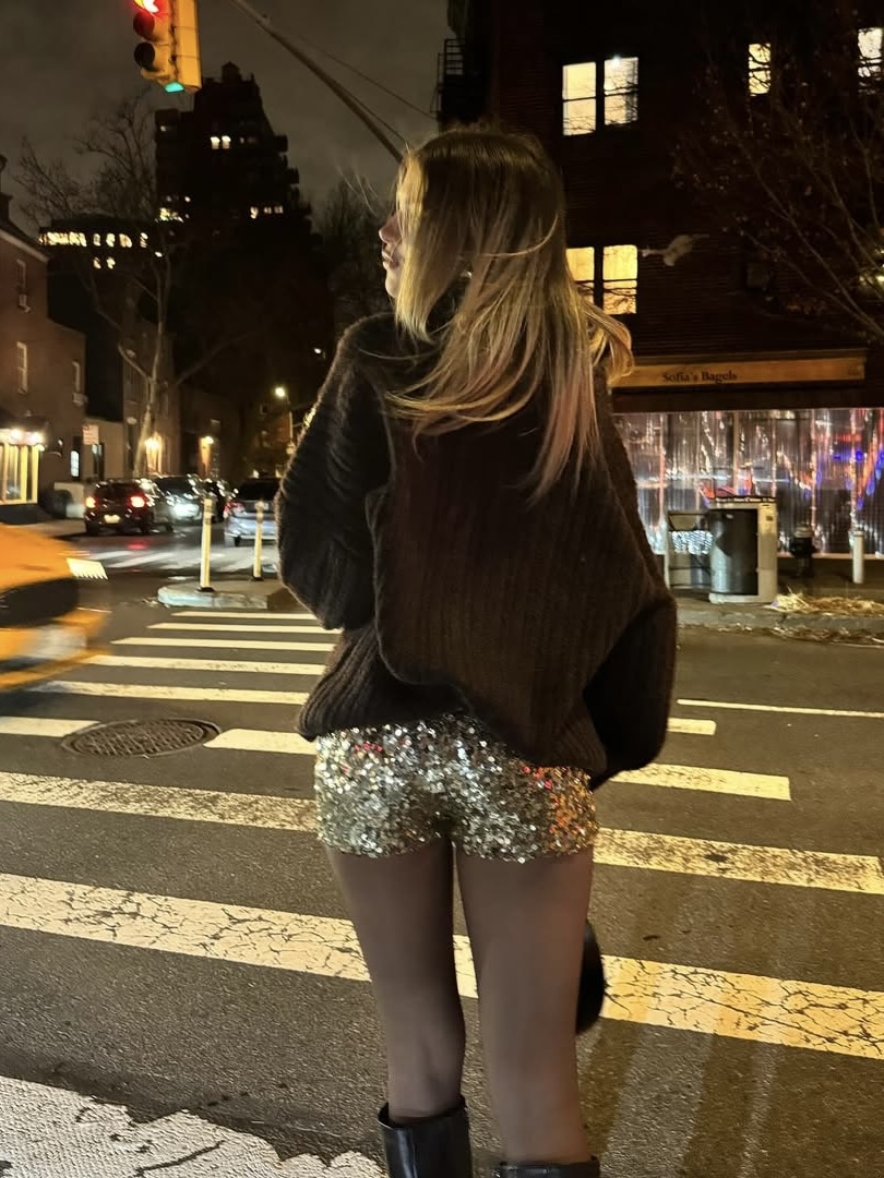 Ireland Hudson wearing sparkly hot pants.