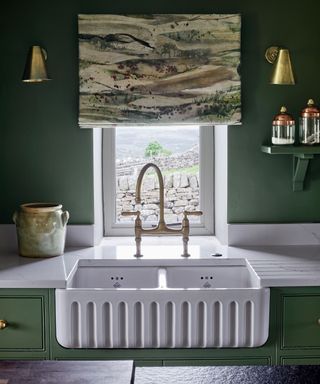 ceramic kitchen sink with gold tap
