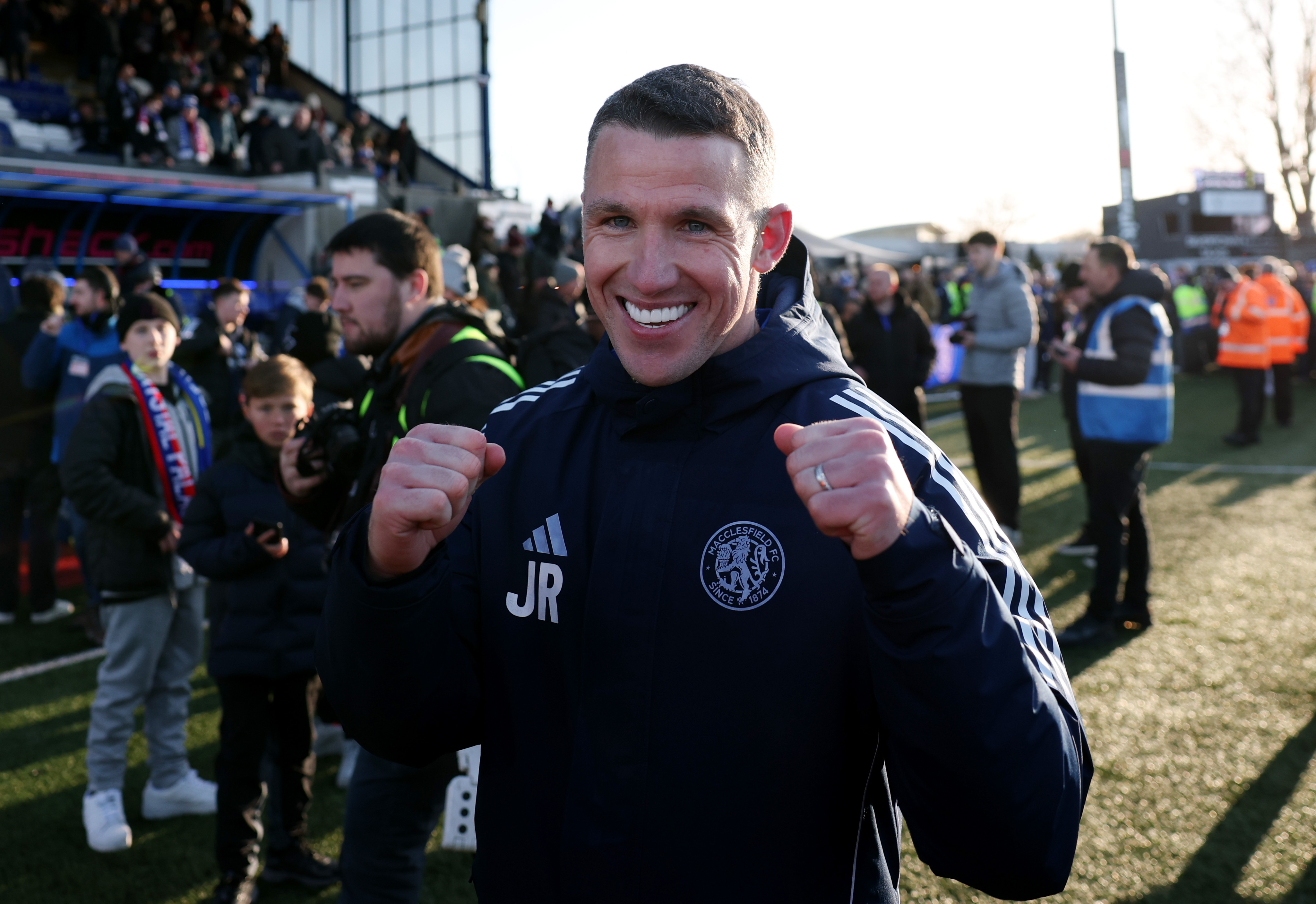 MACCLESFIELD, ENGLAND - JANUARY 10: John Rooney, Manager of Macclesfield, smiles after the team&amp;amp;apos;s victory following the Emirates FA Cup Third Round match between Macclesfield and Crystal Palace at Moss Rose Ground on January 10, 2026 in Macclesfield, England. (Photo by Michael Regan/Getty Images)